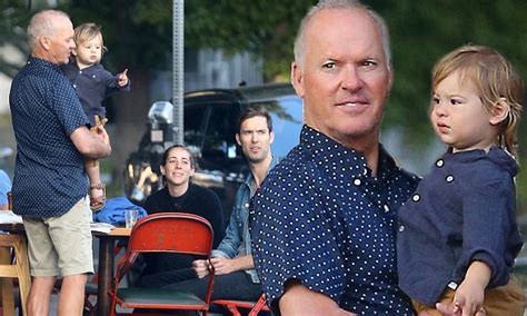 Birdman or (the unexpected virtue of ignorance). Michael Keaton plays doting grandpa as he cuddles up with adorable grandson on family lunch ...