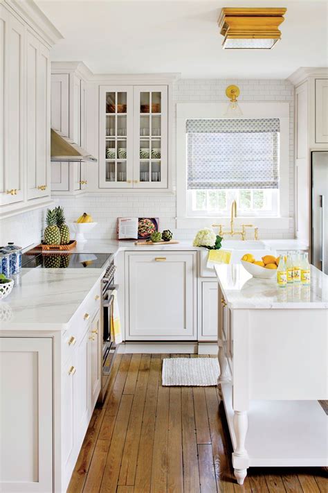 And in this florida kitchen, a beach sign even rests coastal kitchen design, while casual at heart, can also feel quite classic and refined — in the right hands. This Tiny Rehoboth Beach Cottage Is Home to a Family of ...