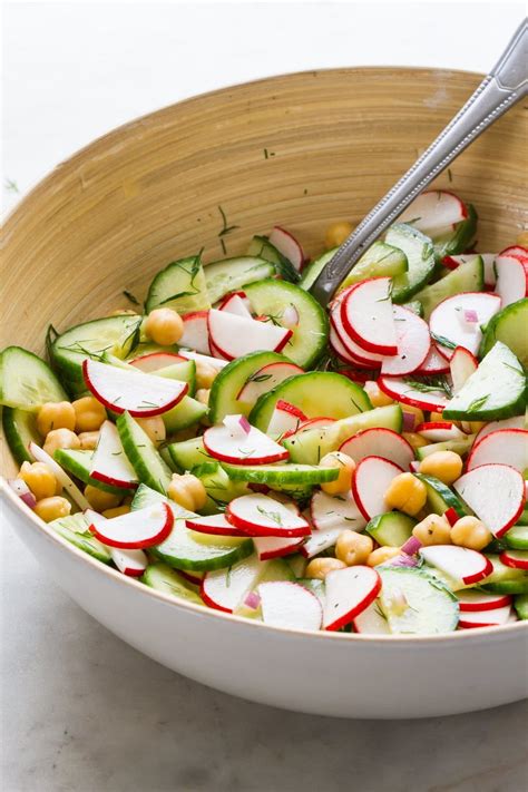Never experienced a daikon radish at all? Radish and Cucumber Salad features peppery radishes, cooling cucumbers and fresh dill tossed ...