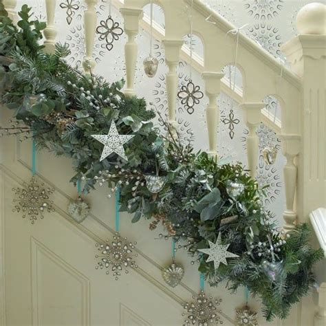 It's covered in hundreds of ornaments and took i asked joy how she created this stunning look and she said, it's two strands of garland wrapped in three strands of 100 lights. 37 Beautiful Christmas Staircase Décor Ideas To Try - DigsDigs
