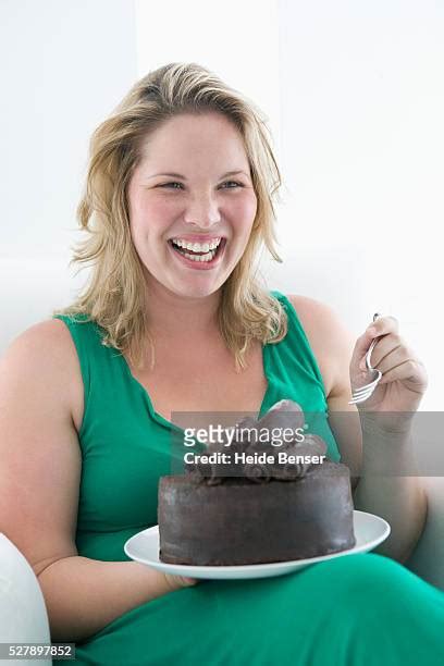 Fat Woman Eating Cake Photos And Premium High Res Pictures Getty Images
