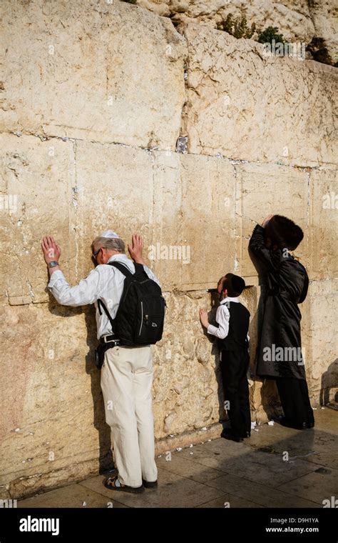 Jewish People Praying At The Wailing Wall Known Also As The Western