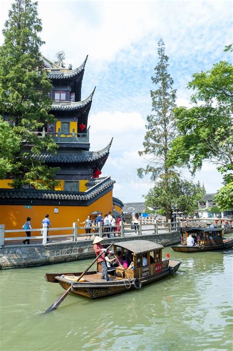 Tourist Sightseeing Boat Cruising Pass Yuanjin Temple In Zhujiajiao