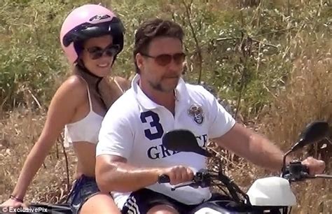 Going My Way Russell Crowe Takes Bikini Clad Blonde On A Spin Around