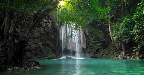 Scenic Nature Of Beautiful Waterfall And Emerald Pool Of Fresh Water Lake In Wild Jungle Forest