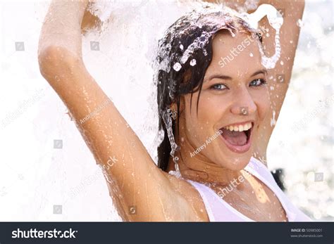 Attractive Sexy Laughing Girl Bathing In City Fountain Stock Photo