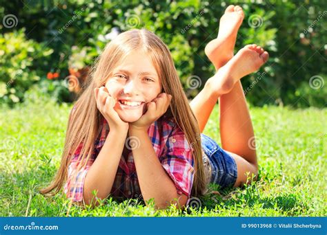 Little Adorable Girl Lying On Grass Stock Photo Image Of Field
