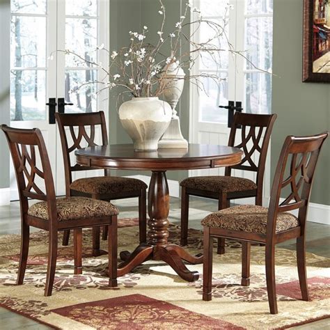 Accent chair with quatrefoil lattice fabric. Ashley Dining Room Sets - Home Furniture Design