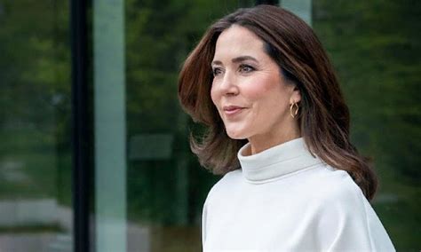 crown princess mary wore an ivory bonnie raw edged blouse by mark kenly domino tan dulong fine