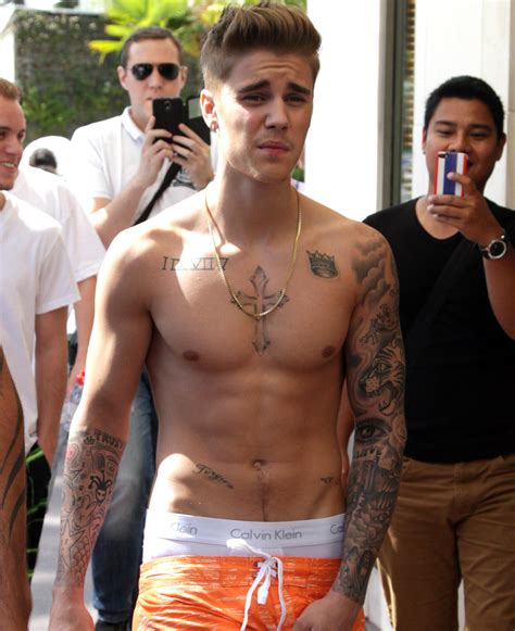 Justin Bieber’s Body Photoshopped For Calvin Klein Ad Photos And Video Suggest Singer’s Body