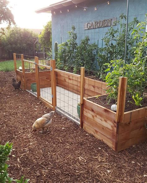 This raised bed is made of 2×6 boards and 2×2 braces. Building A Raised Garden Bed with legs For Your Plants (With images) | Raised garden bed plans ...