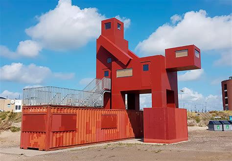 Domestikator This Stunning Sculpture Looks Like Two Buildings Having