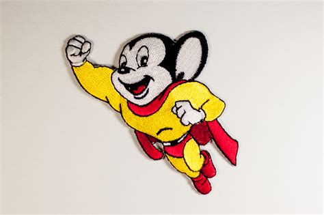 Mighty Mouse Figure Getting Stitched