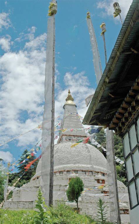 bhutan stupa with eyes flags blue sky sweet breathing deepening into a simple life