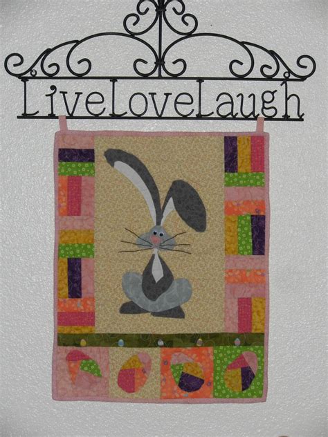 The wire LLL is from Hobby Lobby and I made the Easter Quilt from the