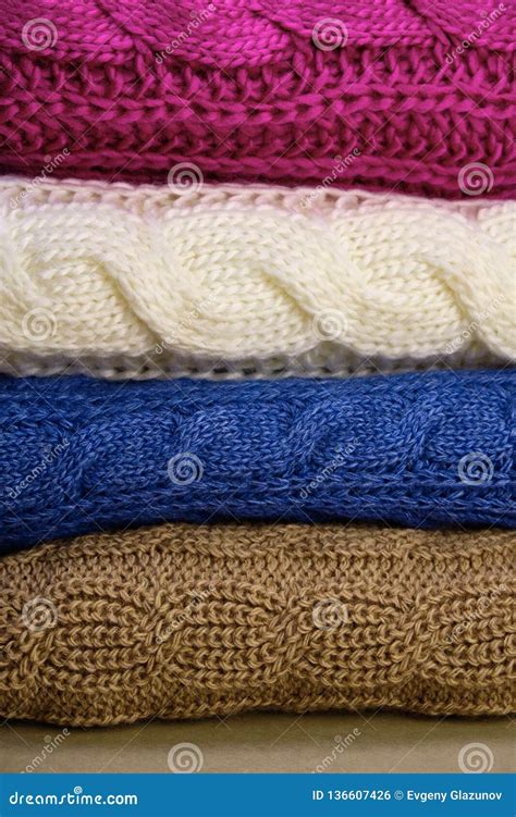 Stack Of Warm Knitwear Close Up Woolen Knit Texture As Background