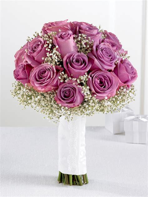 Find images of rose bouquet. Lavender Rose & Gypsophila Bridal Bouquet from Flowers.ie