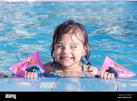 Happy Girl In Swimming Pool Stock Photo Alamy