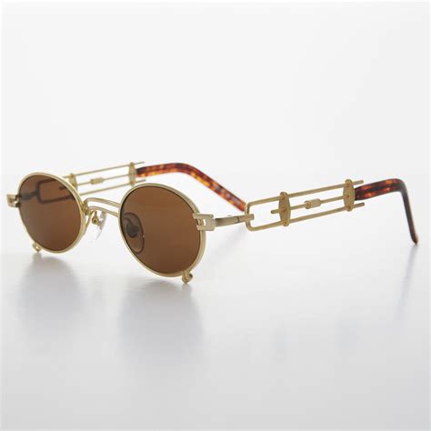 small oval steampunk vintage sunglass with intricate temple design darius steampunk