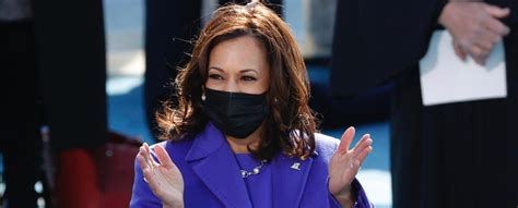 the meaning behind vp kamala harris purple inauguration outfit