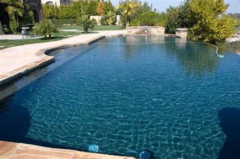 Create your backyard escape with tropical features like npt stonescapes aqua white mini pebble pool finish, a soothing spa and tanning ledge. 17 Best images about Pebble Sheen Ocean Blue on Pinterest ...
