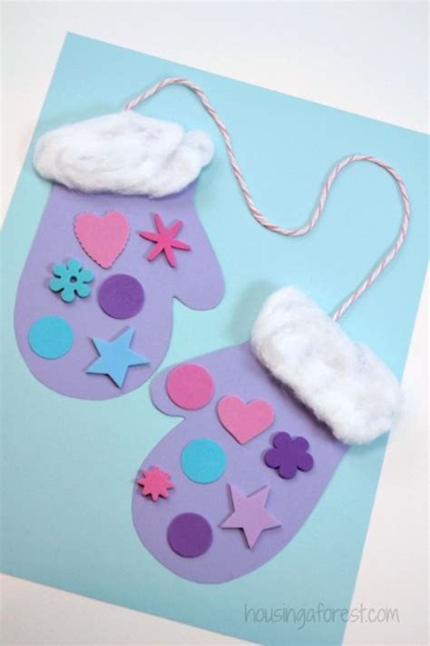 A Pair Of Mitts Made Out Of Paper And Felt