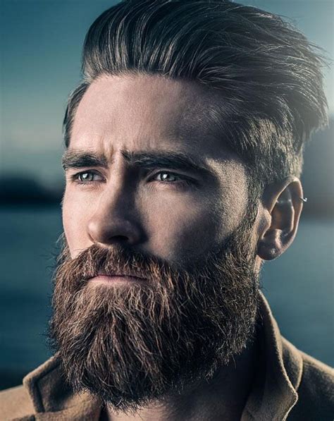 Check out these cool hairstyles for men to get. Slicked back haircut and thick beard | Beard styles, Beard ...