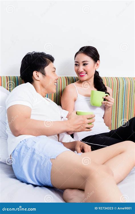 Asian Couple Having Breakfast In Bedroom Stock Image Image Of