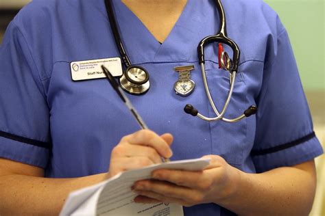nhs workers are being warned to hide their passes because of thie