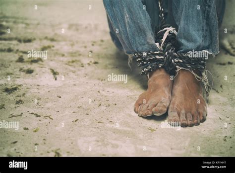 Hopeless Man Feet Tied Together With Rope Stock Photo Alamy