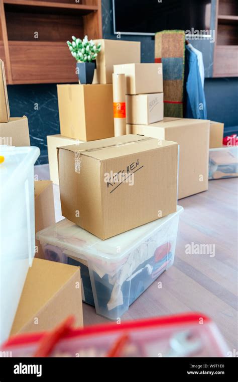 Large Living Room With Stack Of Moving Boxes Stock Photo Alamy