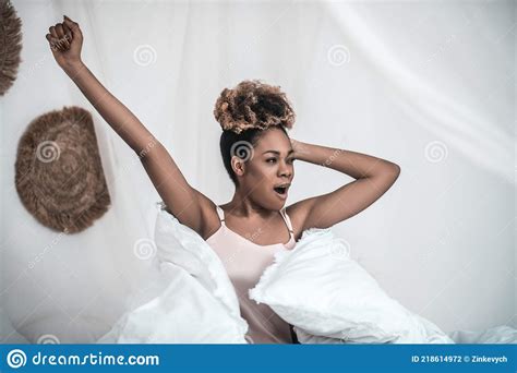 Awakened Dark Skinned Woman Stretching In Bed Stock Photo Image Of