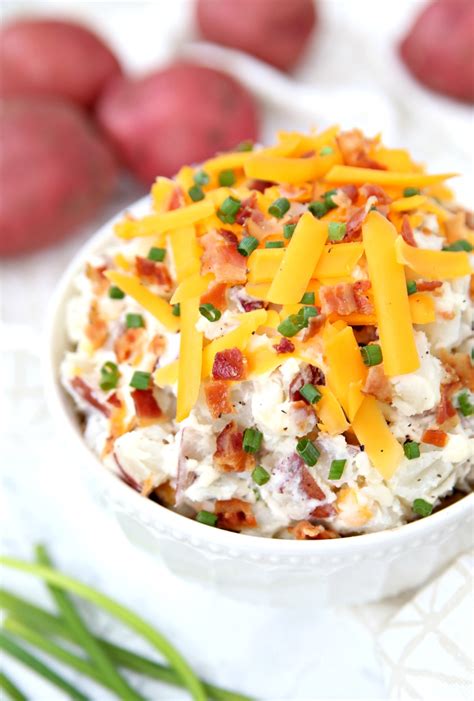 Add potatoes, cheddar cheese, and green onions and stir well. Delicious and Easy Loaded Baked Potato Salad Recipe