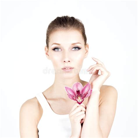 Portrait Of Woman With Permanent Make Up Holding Pink Flower Beauty