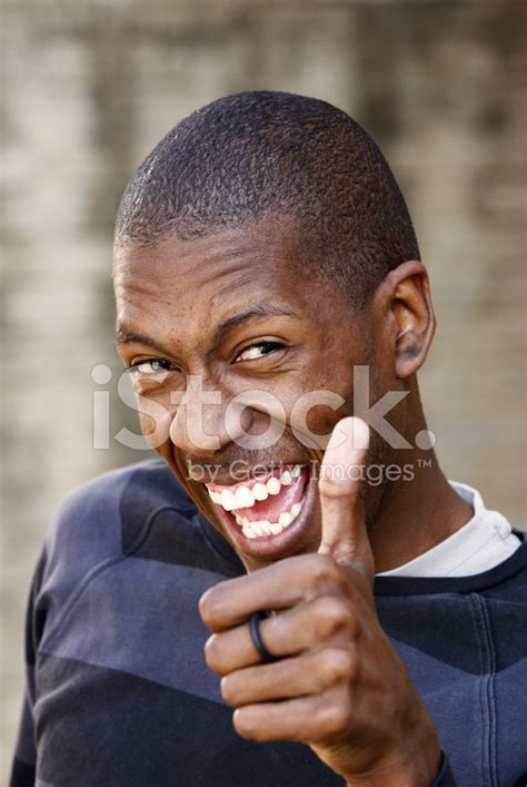 Maybe you would like to learn more about one of these? Thumbs UP Black Man Portrait Stock Photos - FreeImages.com