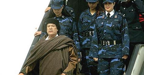 Libya Colonel Gaddafi In Hiding Guarded By A 40 Strong Squad Of Gun Toting Female Virgin