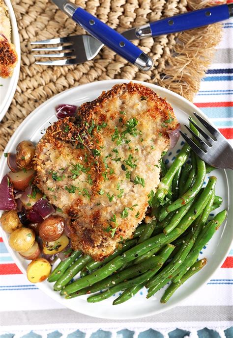 Looking for a pork chop recipe? Parmesan Crusted Baked Pork Chops with Roasted Potatoes ...