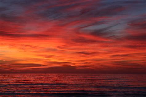 Royalty Free Photo A Red Sky Sunset Over The Ocean Pickpik