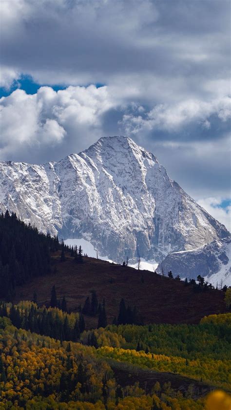 Download Wallpaper 938x1668 Mountains Snow Clouds Trees Landscape