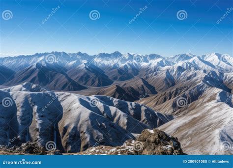 Majestic Mountain Ranges With Snow Capped Peaks And Clear Blue Skies