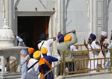 Sword Wielding Sikhs Clash At India S Golden Temple During Prayers