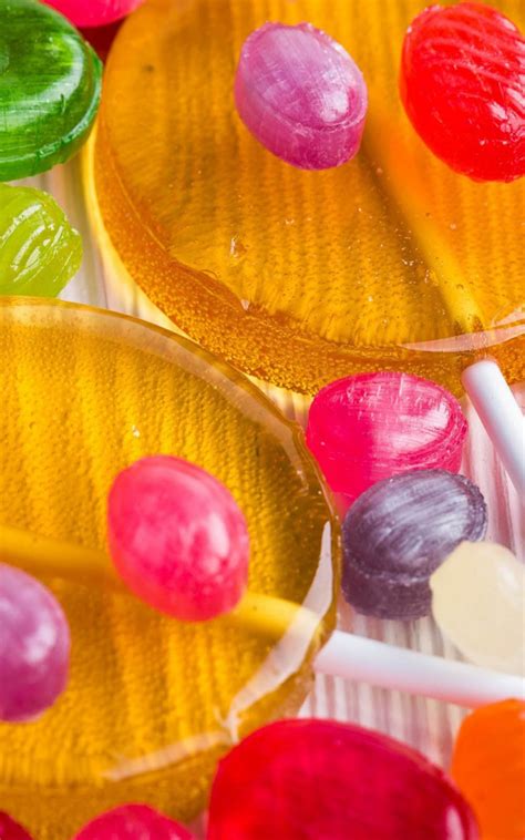 Colorful Lollipops And Candies 4k Ultra Hd Mobile Wallpaper
