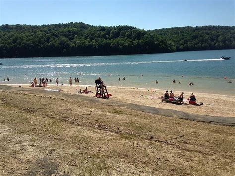 Summersville lake is a dreamy retreat complete with scenery including a lighthouse and cabins. 10 Things You Must Do In West Virginia On A Hot, Summer Day