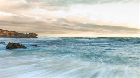 Download Wallpaper 3840x2160 Coast Sand Sea Rocks Stones Horizon