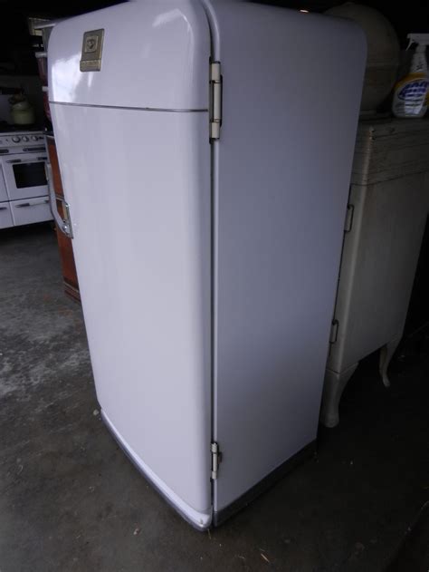Store more with gallon door bins and adjustable shelves and drawers. 1950 Frigidaire refrigerator available