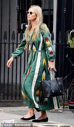 Kate Moss Flashes Her Toned Legs In A Printed Dress While Stepping With