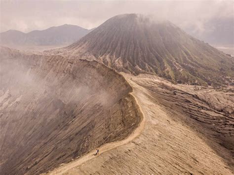 Aerial View Of Mount Bromo Crater Releasing Smoke From Magma An Active