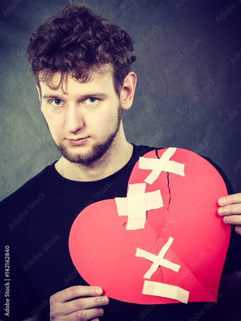 Sad Man With Glued Heart By Plaster Stock Foto Adobe Stock