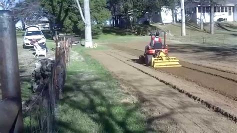 My Aunt Tilling The Garden With The Kubota Bx 2350 Youtube