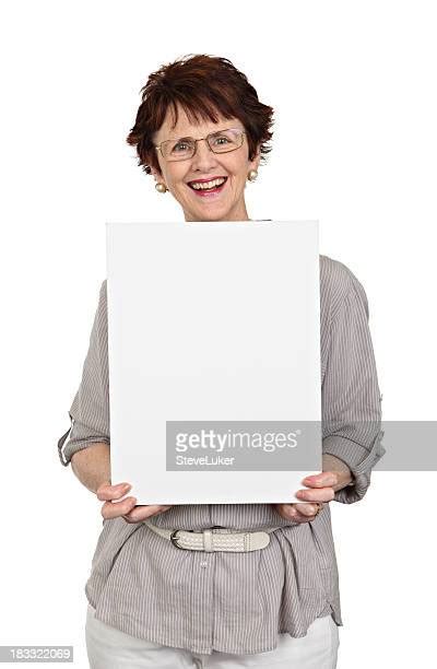 Older Woman Holding Blank Sign Photos And Premium High Res Pictures